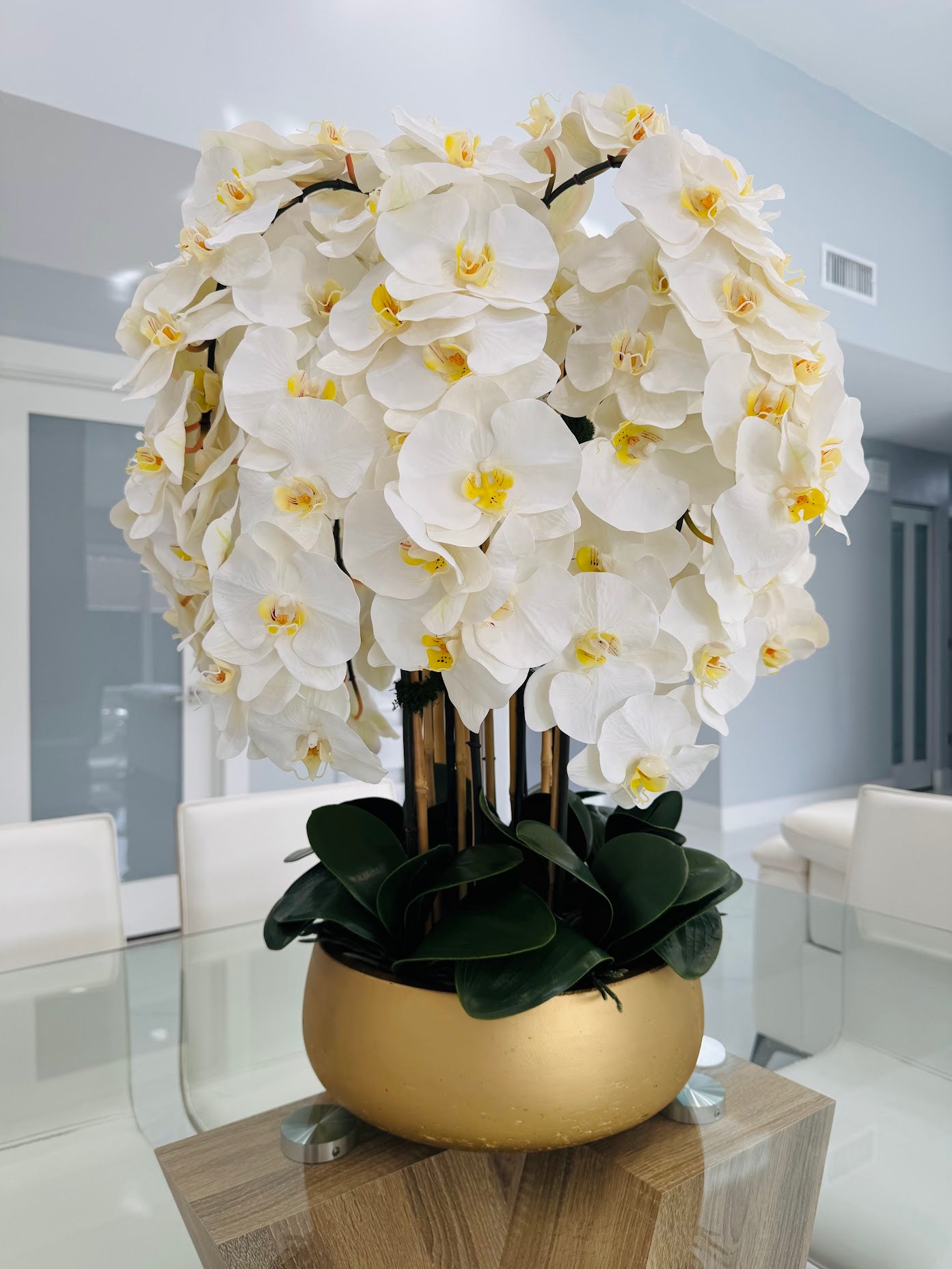 WHITE ORCHIDS IN GOLD VASE