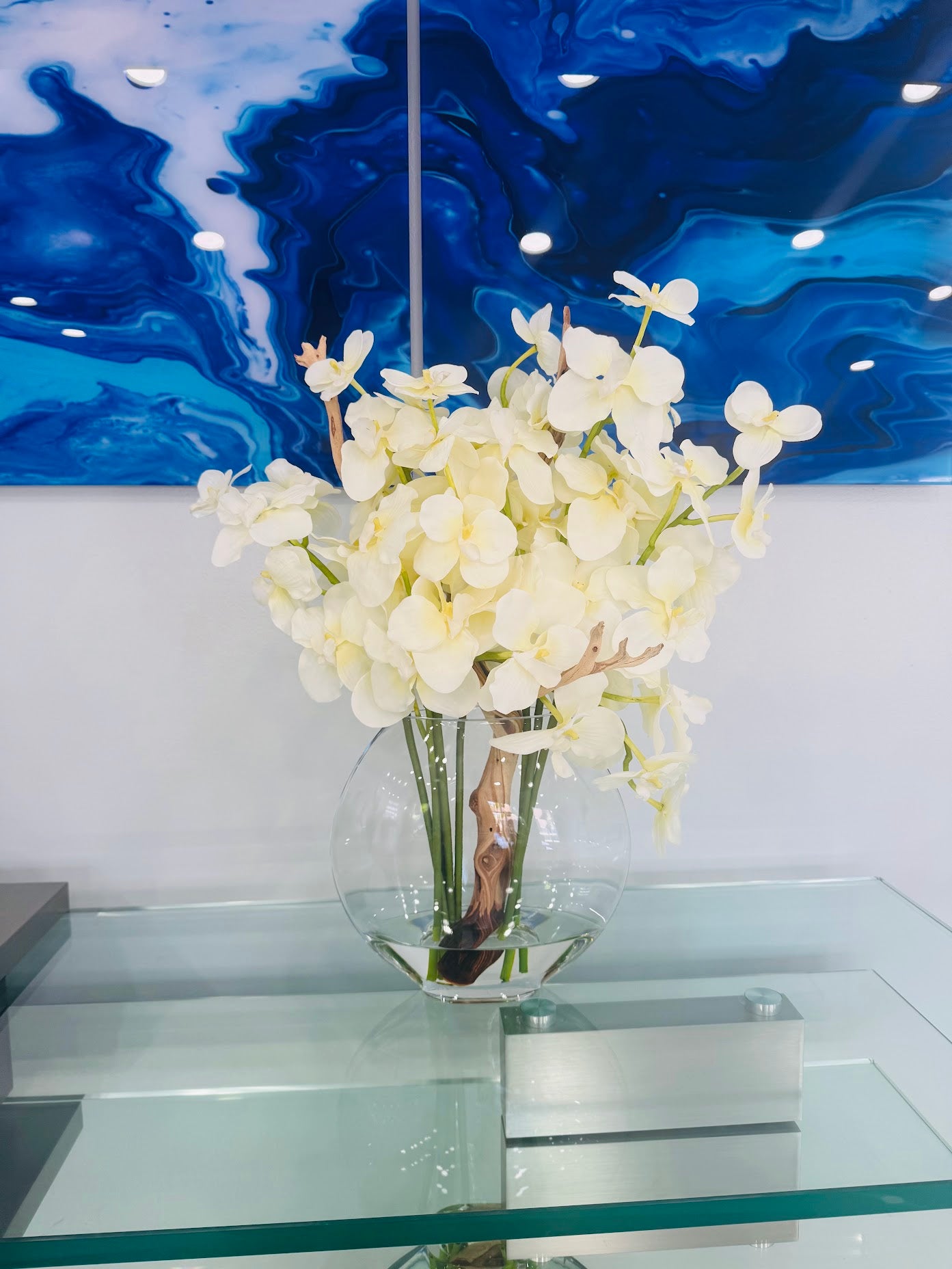 ORCHIDS IN MOON VASE