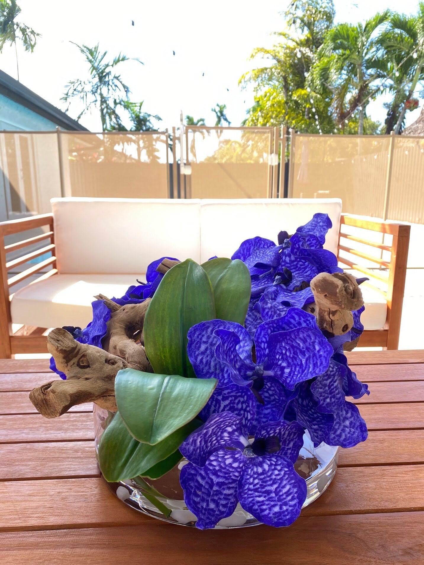 BOWL WITH ORCHIDS AND WOOD