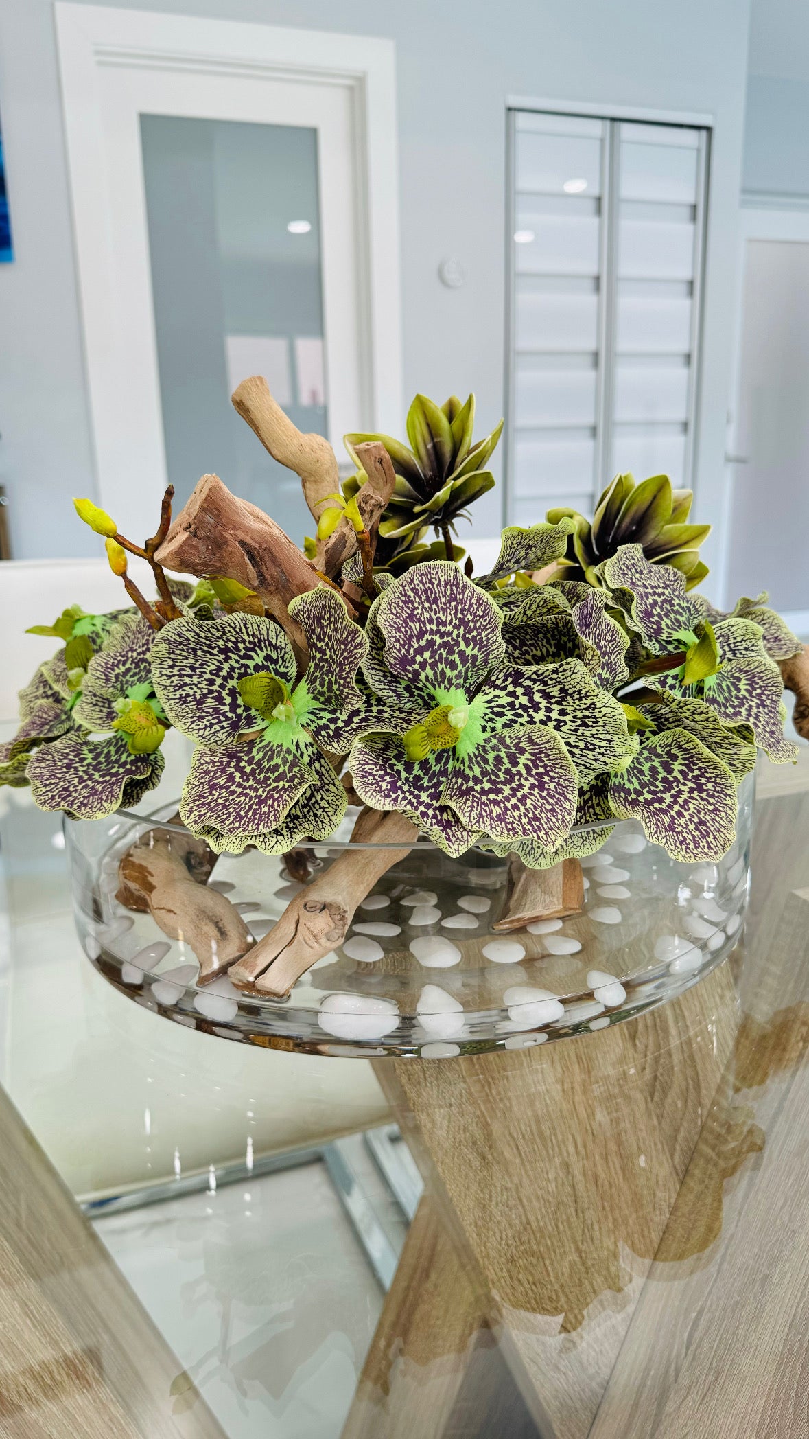 BOWL WITH ORCHIDS, MAGNOLIAS AND WOOD