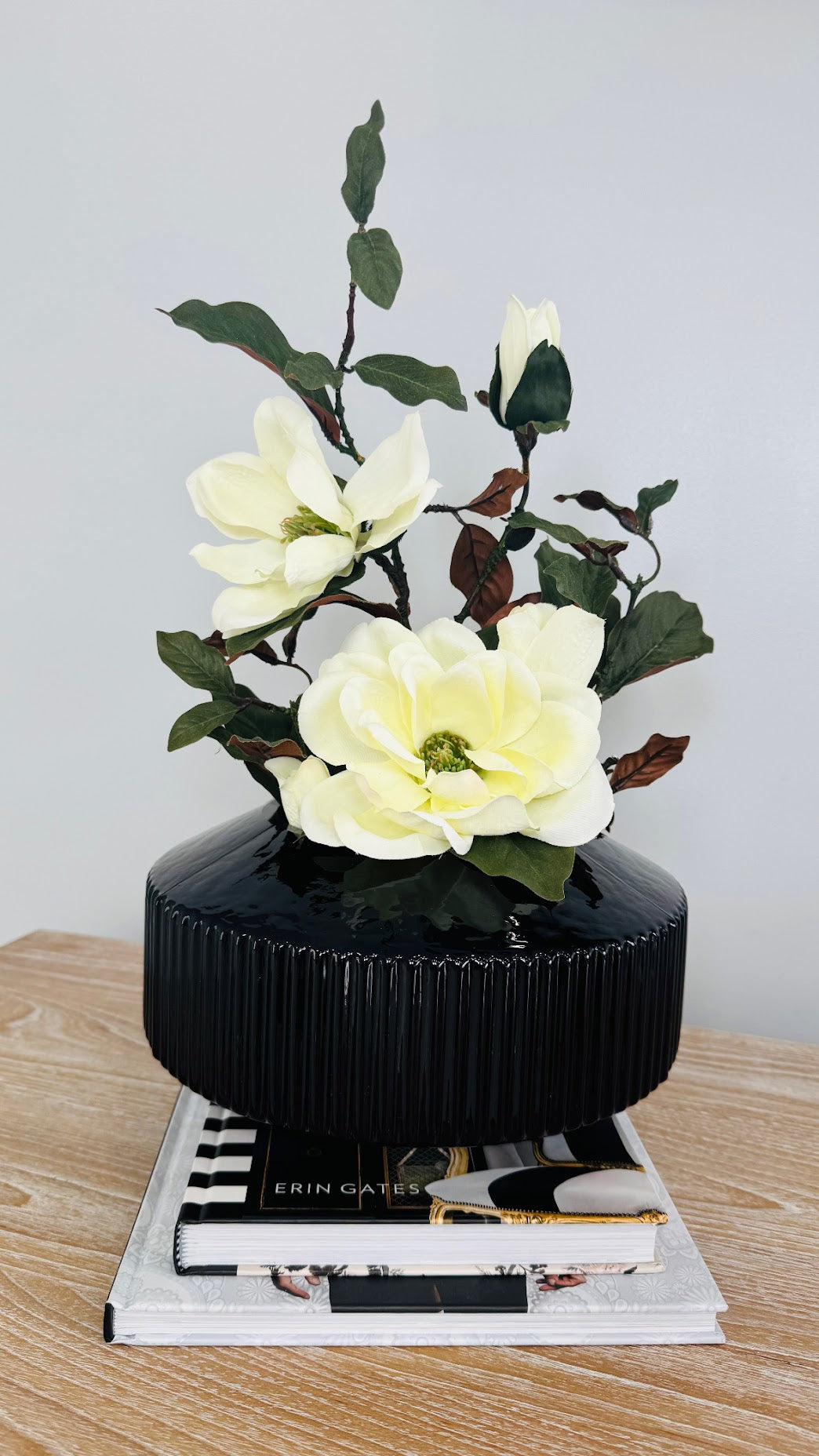 MAGNOLIA WITH BRANCH IN BLACK VASE
