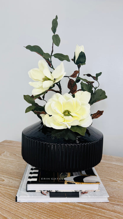 MAGNOLIA WITH BRANCH IN BLACK VASE