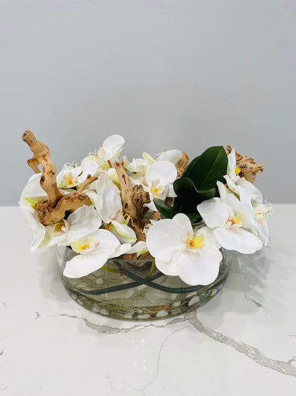 BOWL WITH WHITE ORCHIDS AND WOOD