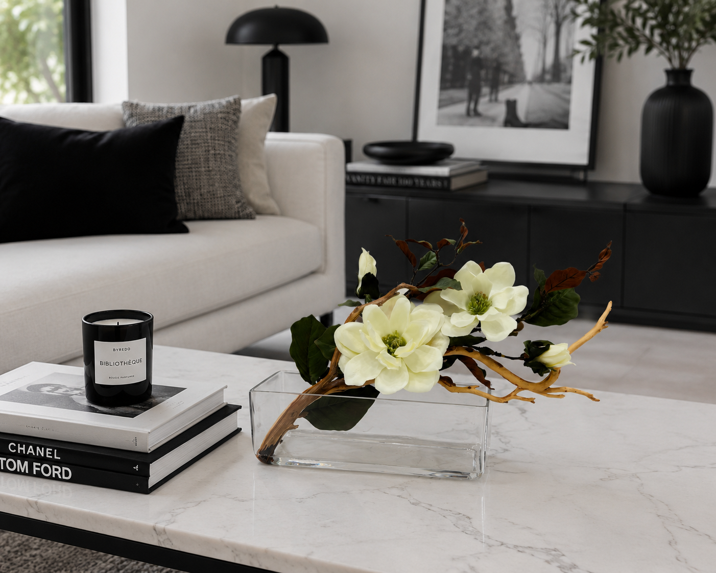 MAGNOLIA WITH BRANCH AND WOOD IN RECTANGULAR VASE