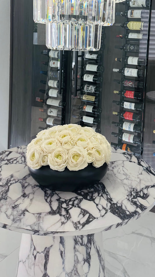 RANUNCULUS IN CERAMIC BLACK VASE