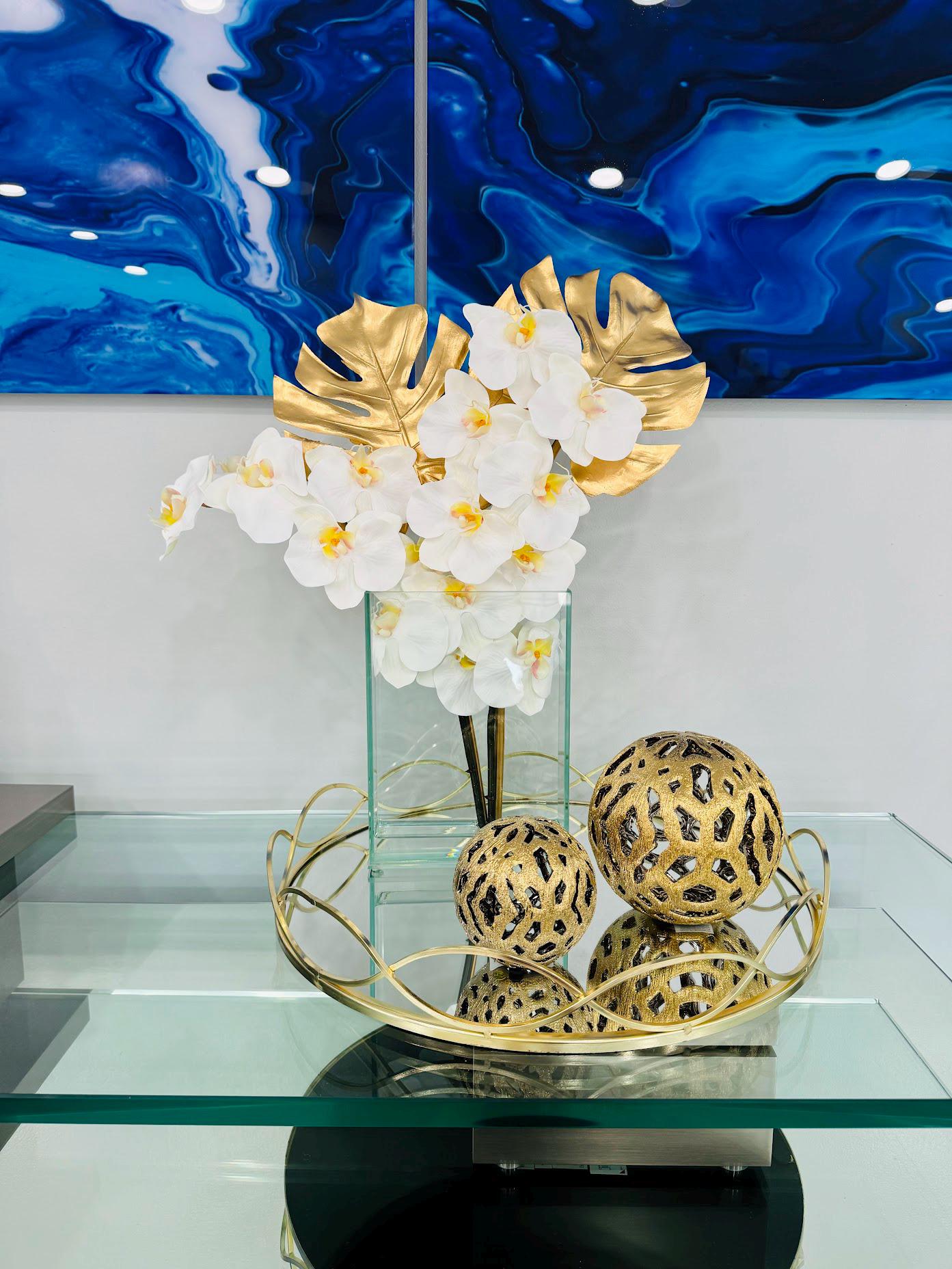 WHITE ORCHIDS WITH GOLD LEAVES IN GLASS BASE