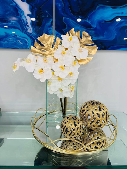 WHITE ORCHIDS WITH GOLD LEAVES IN GLASS BASE
