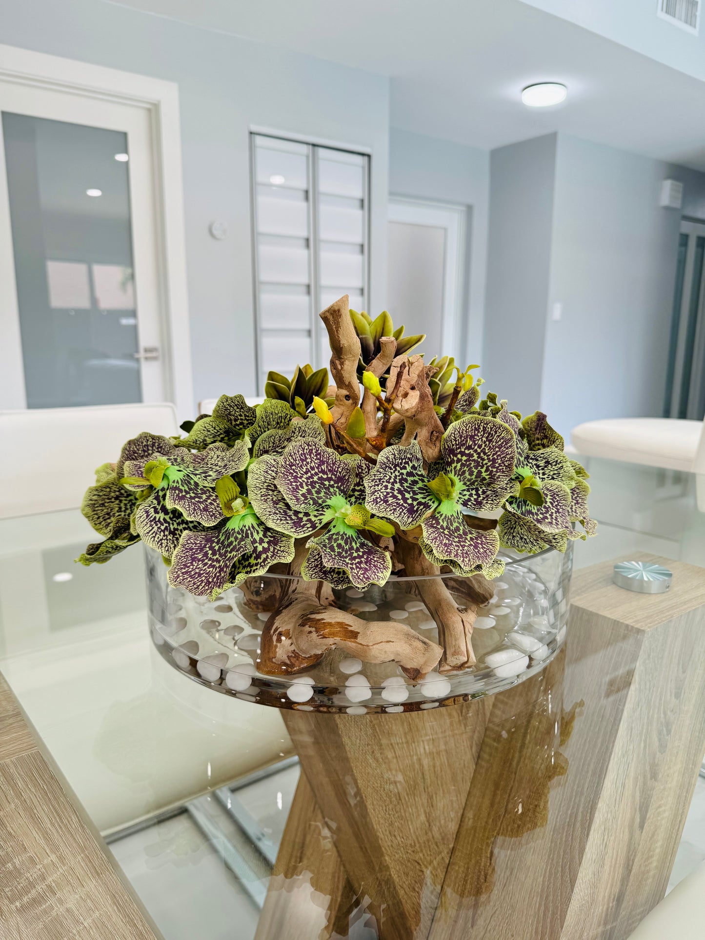 BOWL WITH ORCHIDS, MAGNOLIAS AND WOOD