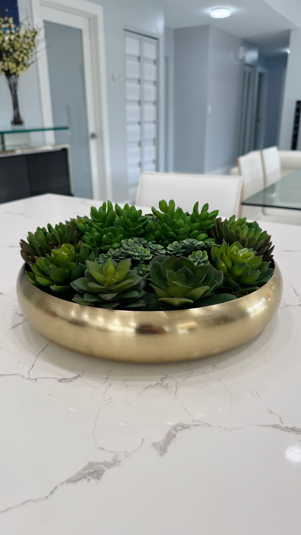ARTIFICIAL SUCCULENT CENTERPIECE IN GOLD BOWL