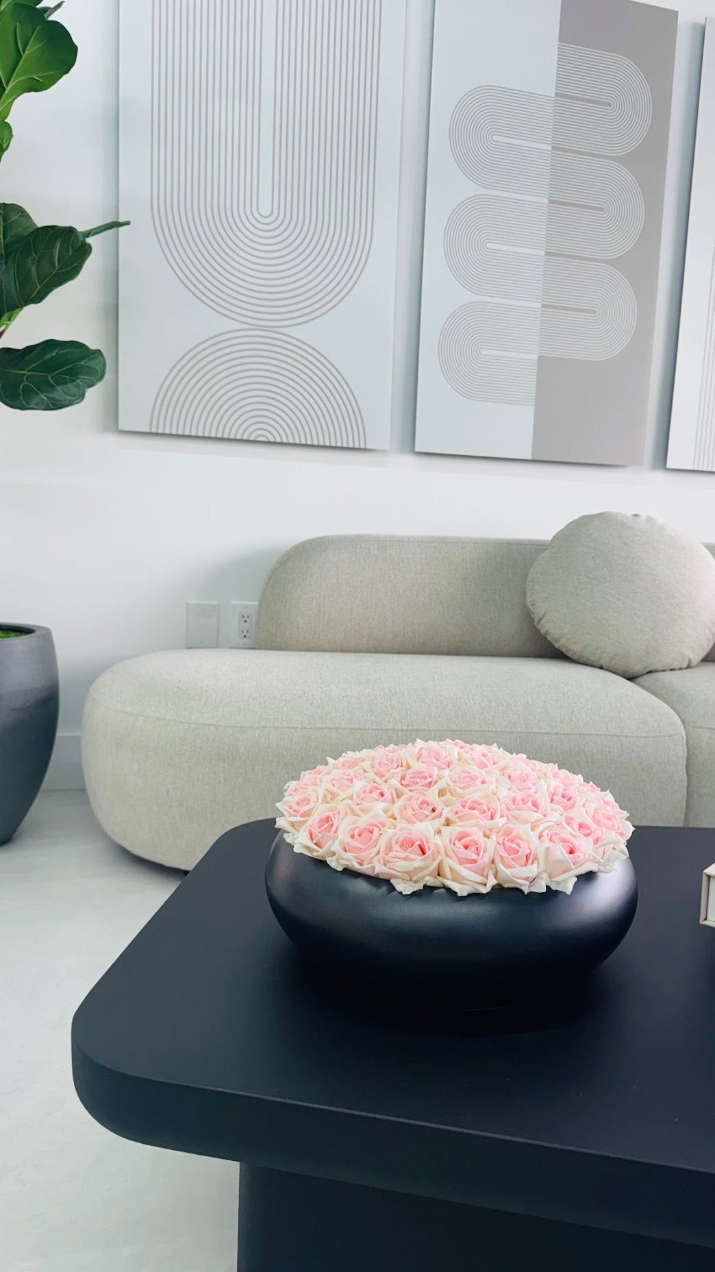 PINK ROSES IN CERAMIC BLACK VASE