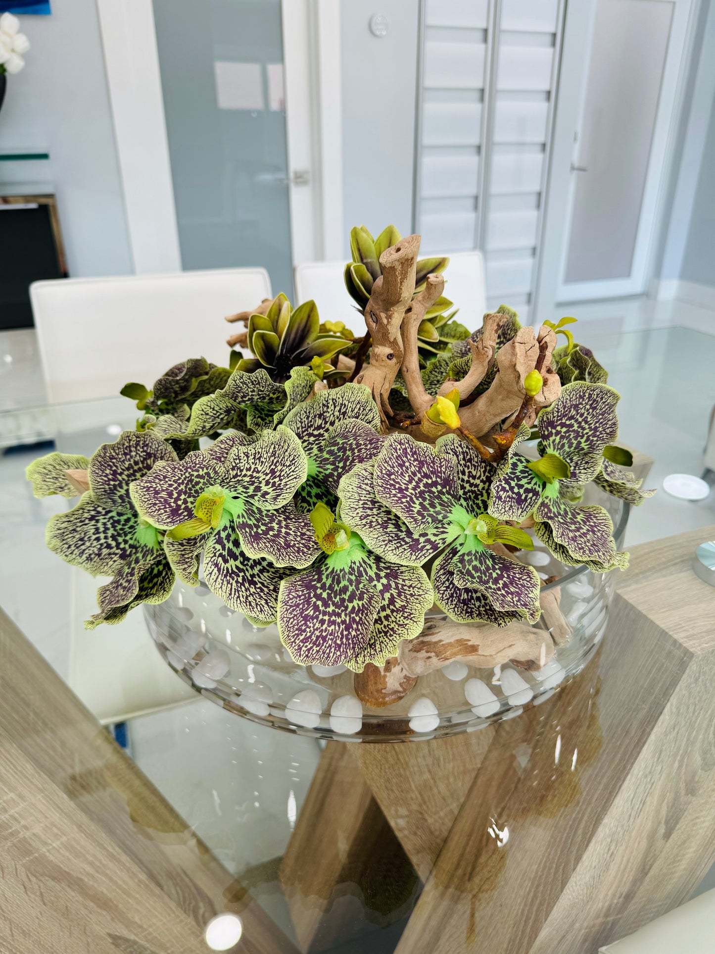 BOWL WITH ORCHIDS, MAGNOLIAS AND WOOD