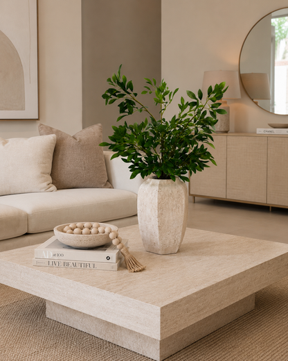 GREEN FOLIAGE ARRANGEMENT IN TEXTURED STONE VASE