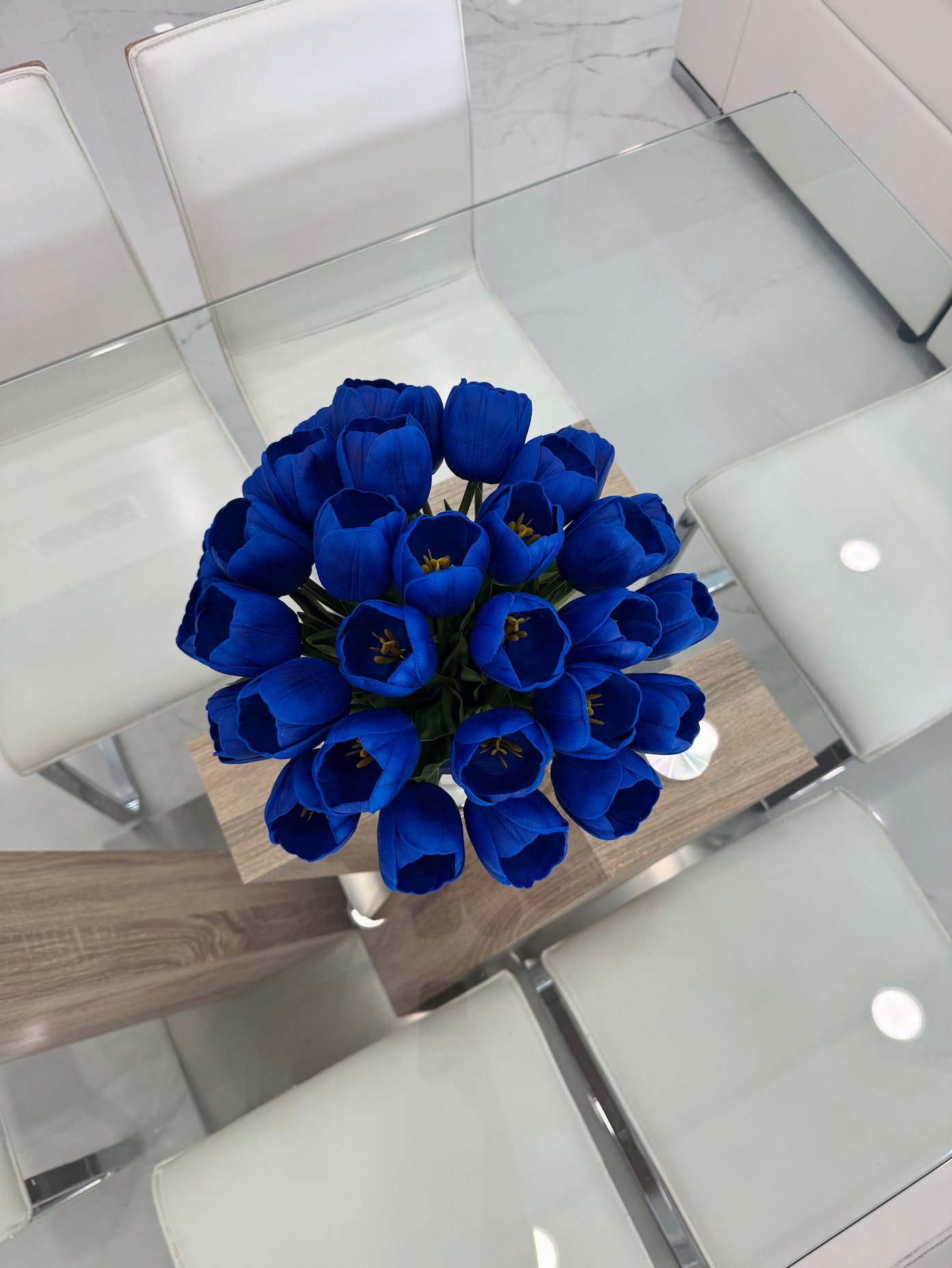 BLUE TULIP ARRANGEMENT IN SILVER GLASS VASE