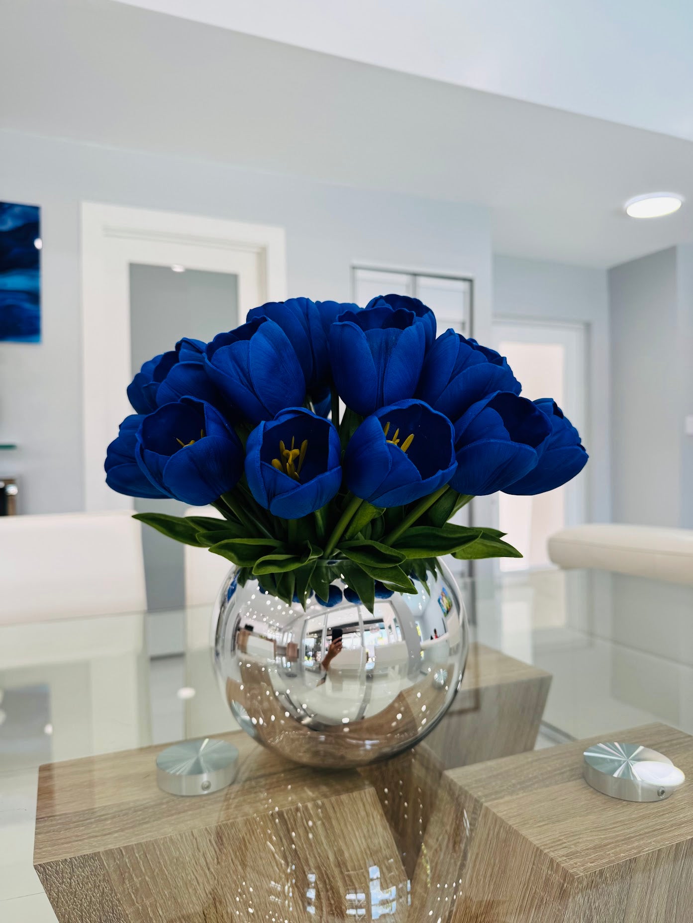 BLUE TULIP ARRANGEMENT IN SILVER GLASS VASE