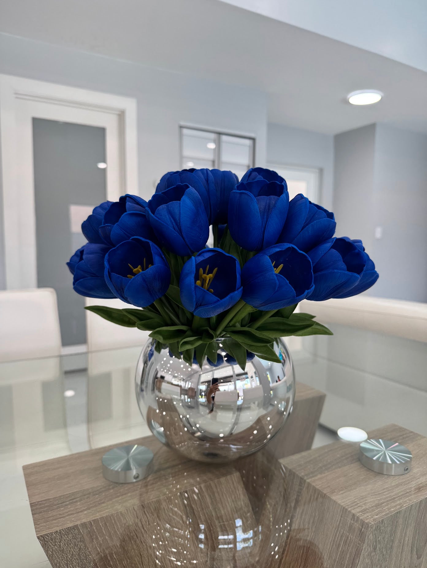 BLUE TULIP ARRANGEMENT IN SILVER GLASS VASE