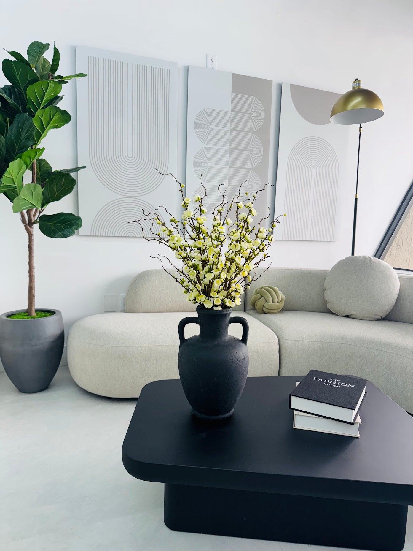 PLUM BLOSSOM IN BLACK CERAMIC VASE