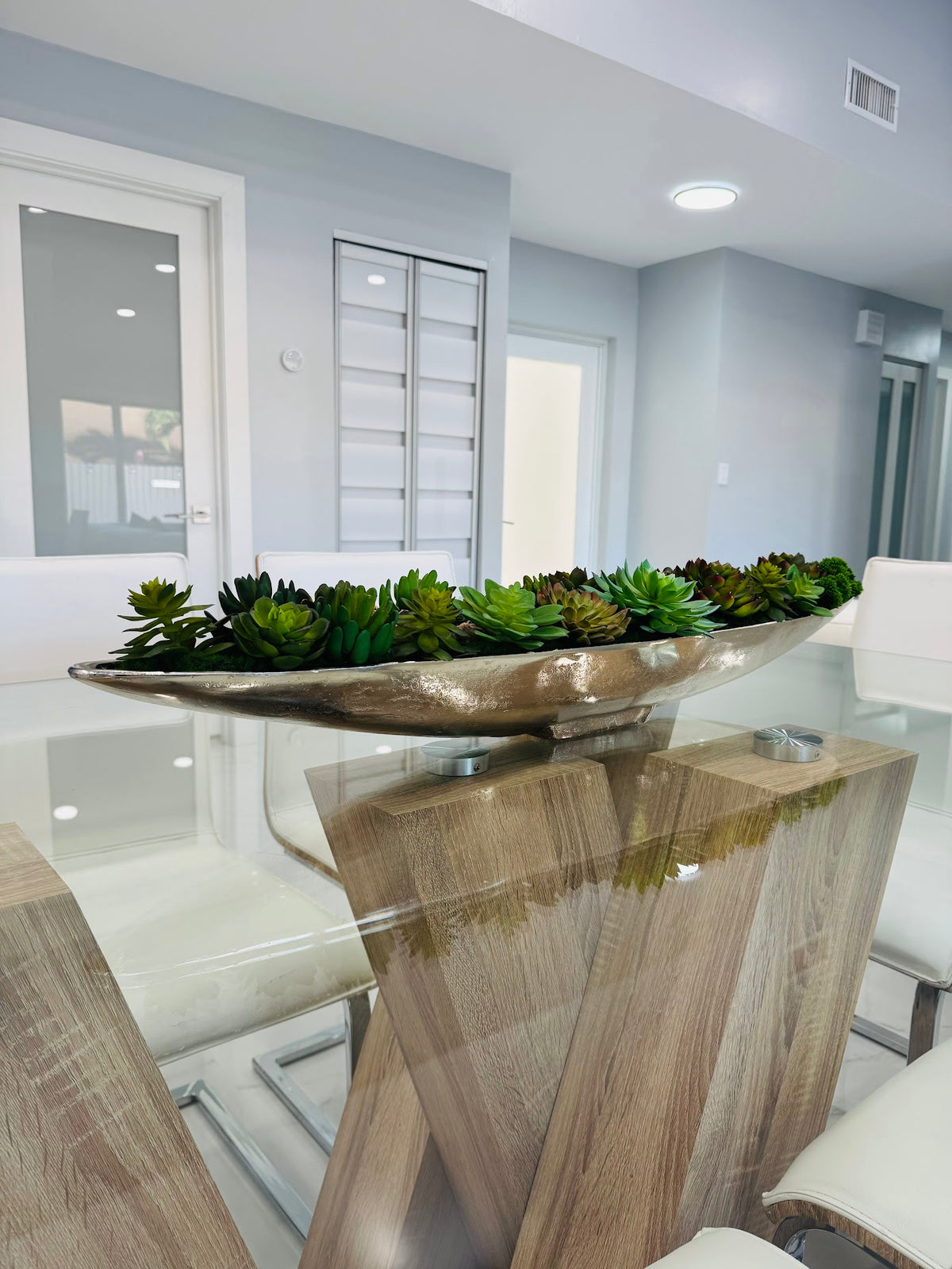 LUXURY GREEN SUCCULENT ARRANGEMENT IN SILVER BOAT VASE