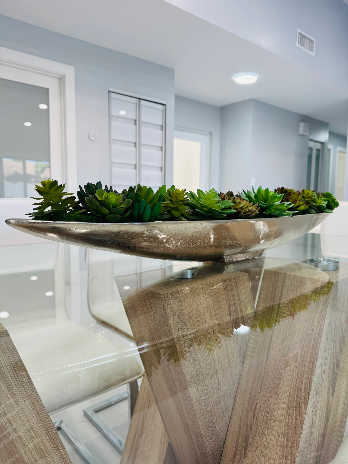 LUXURY GREEN SUCCULENT ARRANGEMENT IN SILVER BOAT VASE