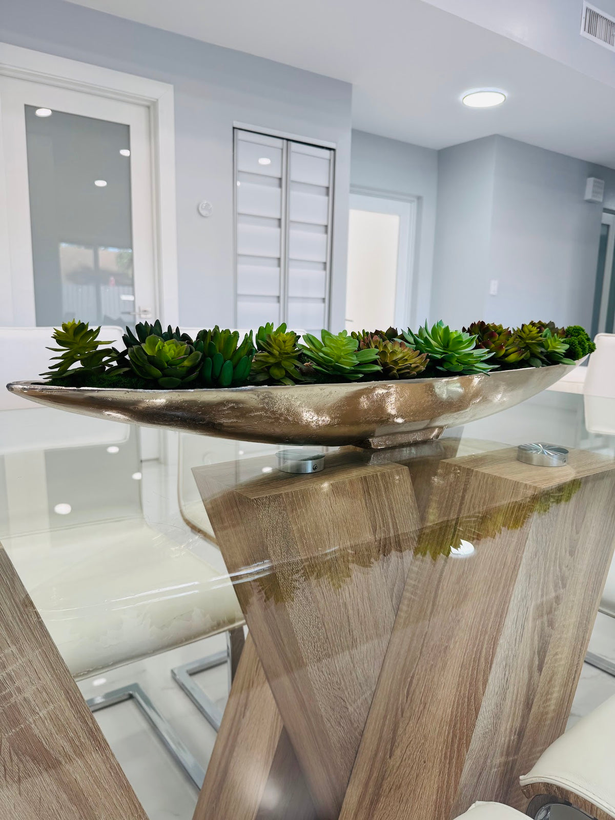 LUXURY GREEN SUCCULENT ARRANGEMENT IN SILVER BOAT VASE
