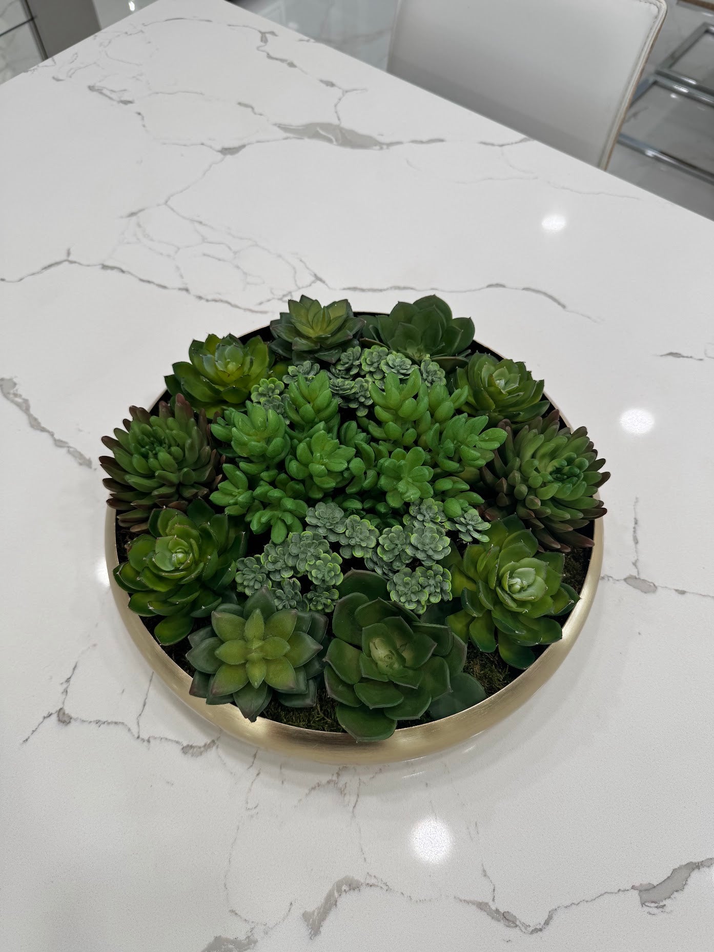 ARTIFICIAL SUCCULENT CENTERPIECE IN GOLD BOWL