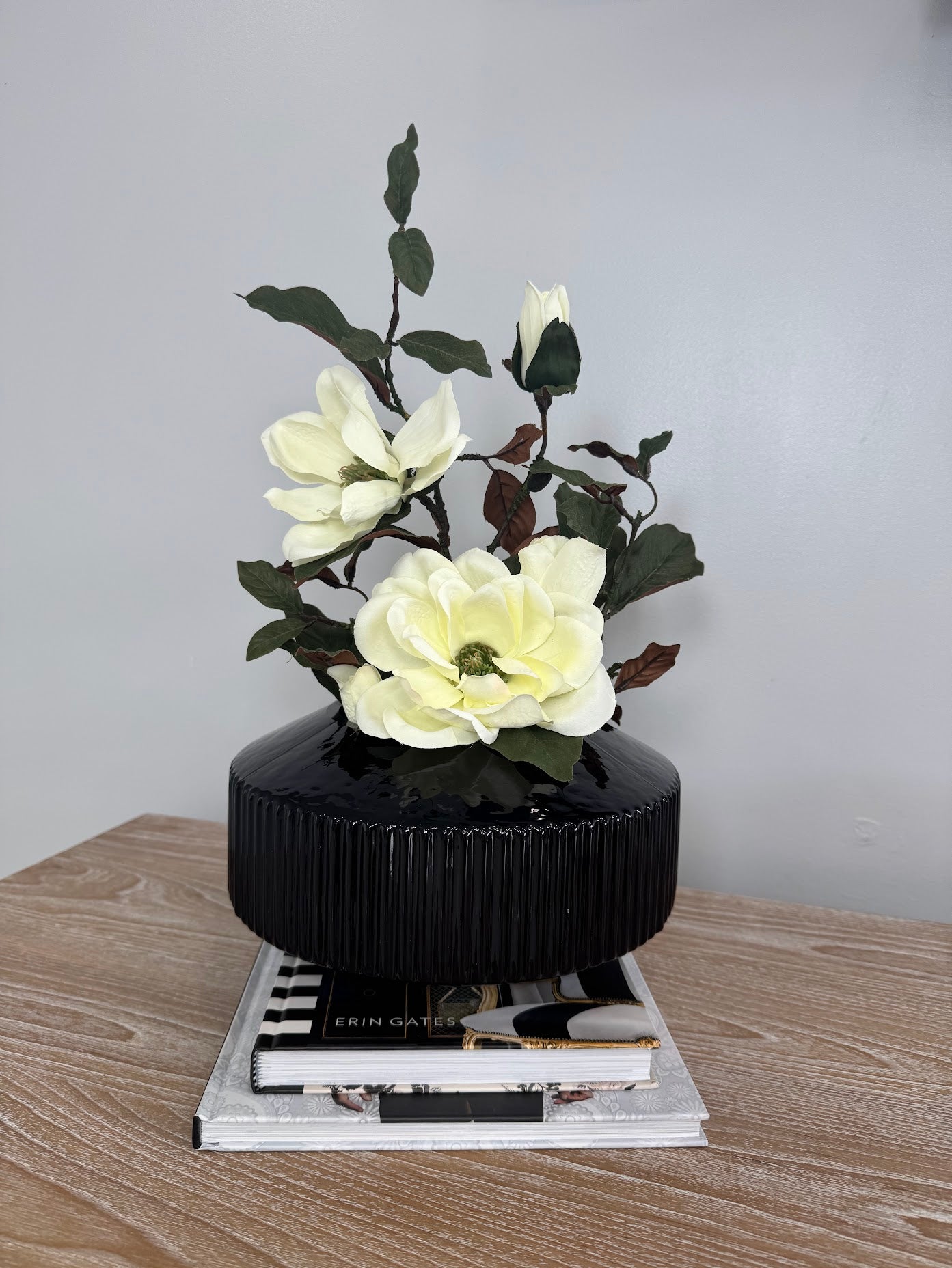 MAGNOLIA WITH BRANCH IN BLACK VASE