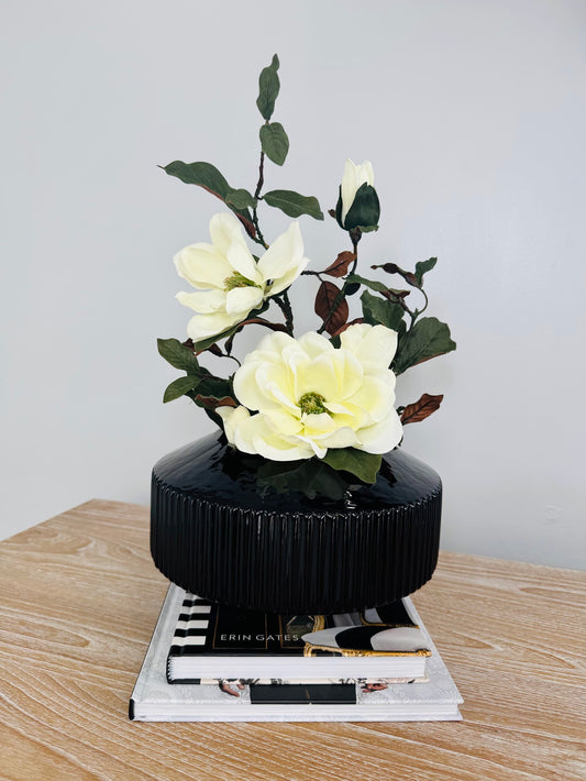 MAGNOLIA WITH BRANCH IN BLACK VASE