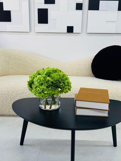 GREEN HYDRANGEAS IN CYLINDER VASE