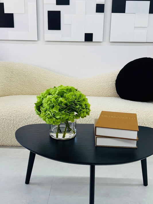 GREEN HYDRANGEAS IN CYLINDER VASE