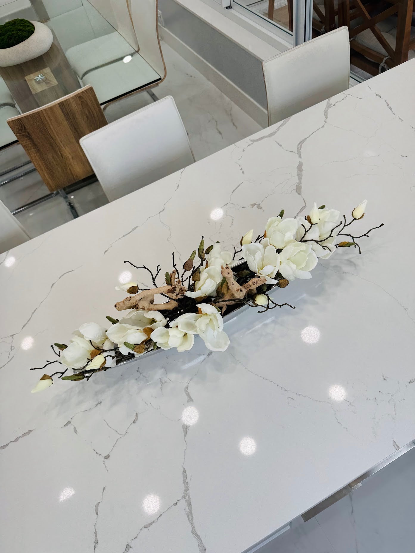 SILVER METAL BOAT WITH MAGNOLIAS AND WOOD