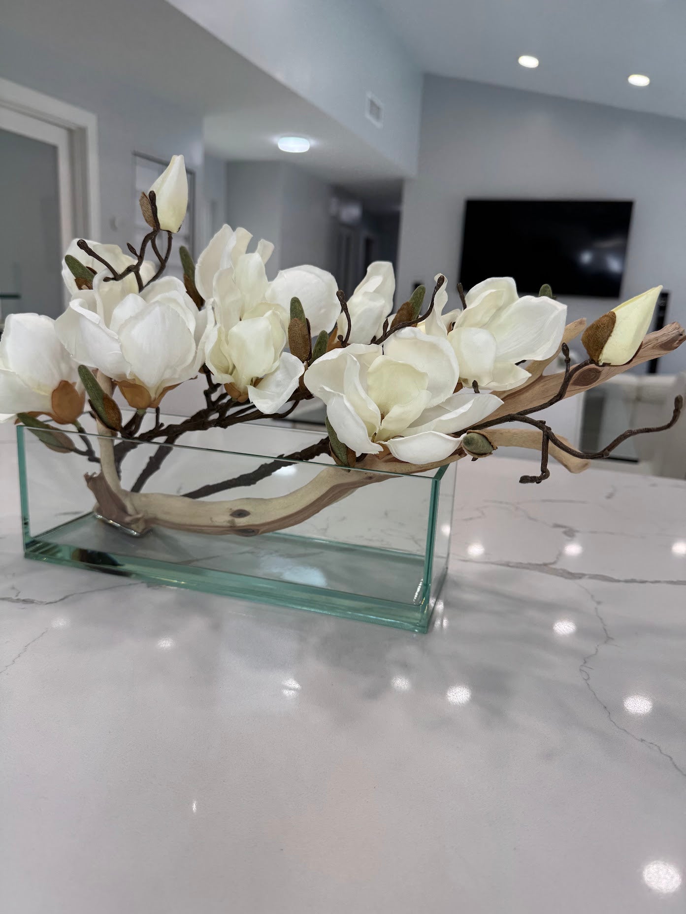 MAGNOLIA WITH WOOD IN RECTANGULAR VASE