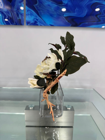MAGNOLIA WITH BRANCH AND WOOD IN RECTANGULAR VASE