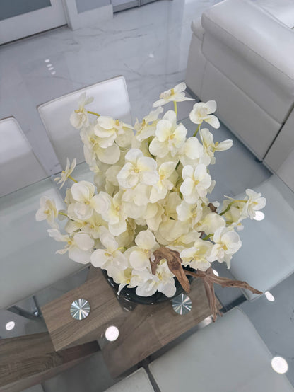 WHITE ORCHID DRIFTWOOD ARRANGEMENT IN BLACK GLOBE VASE