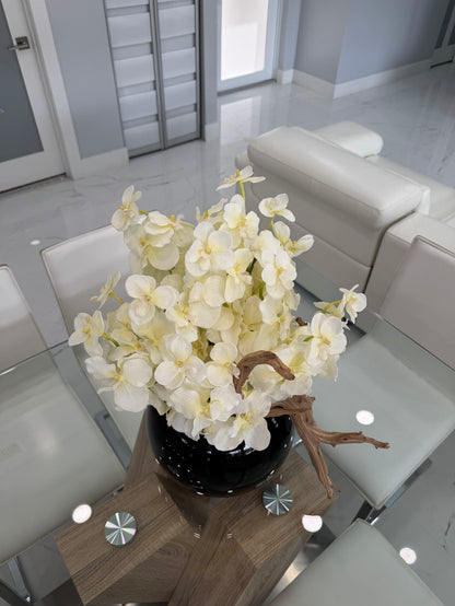 WHITE ORCHID DRIFTWOOD ARRANGEMENT IN BLACK GLOBE VASE