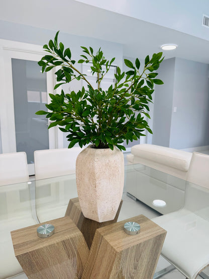 GREEN FOLIAGE ARRANGEMENT IN TEXTURED STONE VASE
