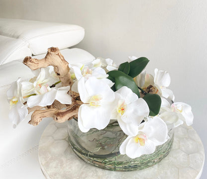 BOWL WITH WHITE ORCHIDS AND WOOD
