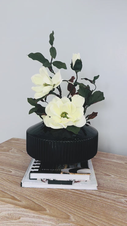 MAGNOLIA WITH BRANCH IN BLACK VASE