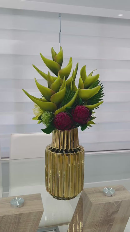 TROPICAL PROTEA & HELICONIA ARRANGEMENT IN GOLD VASE