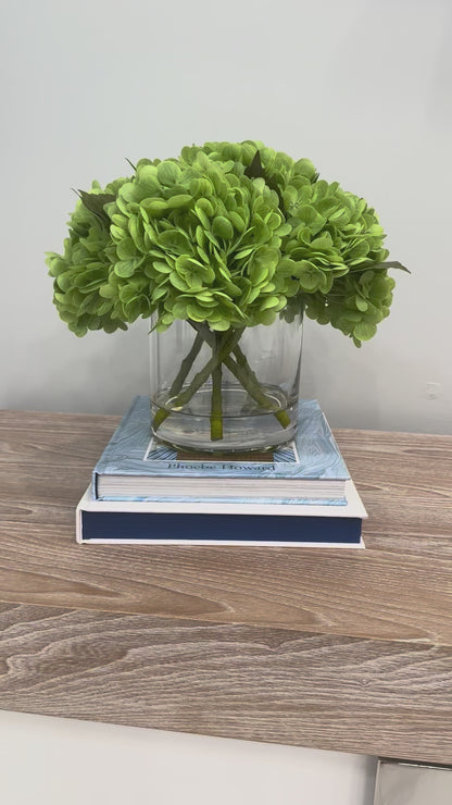 GREEN HYDRANGEAS IN CYLINDER VASE
